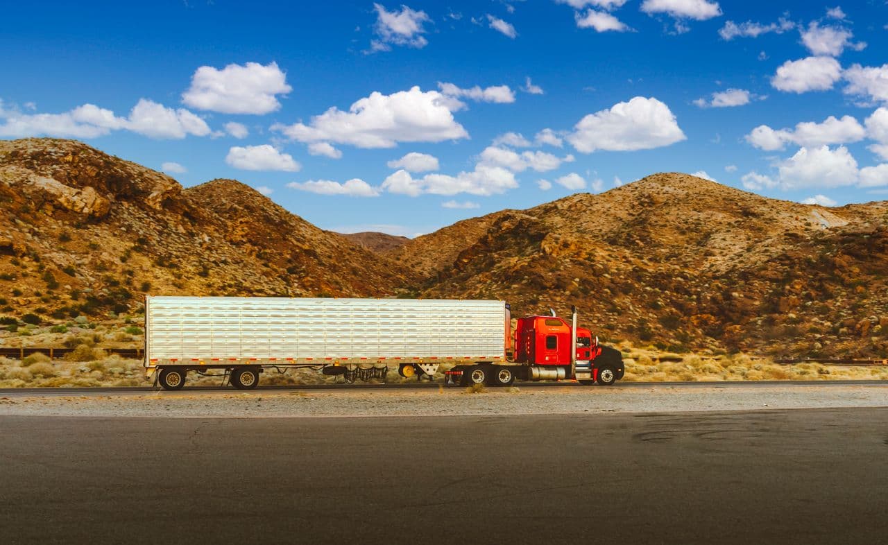 A freight truck transporting cargo on the highway